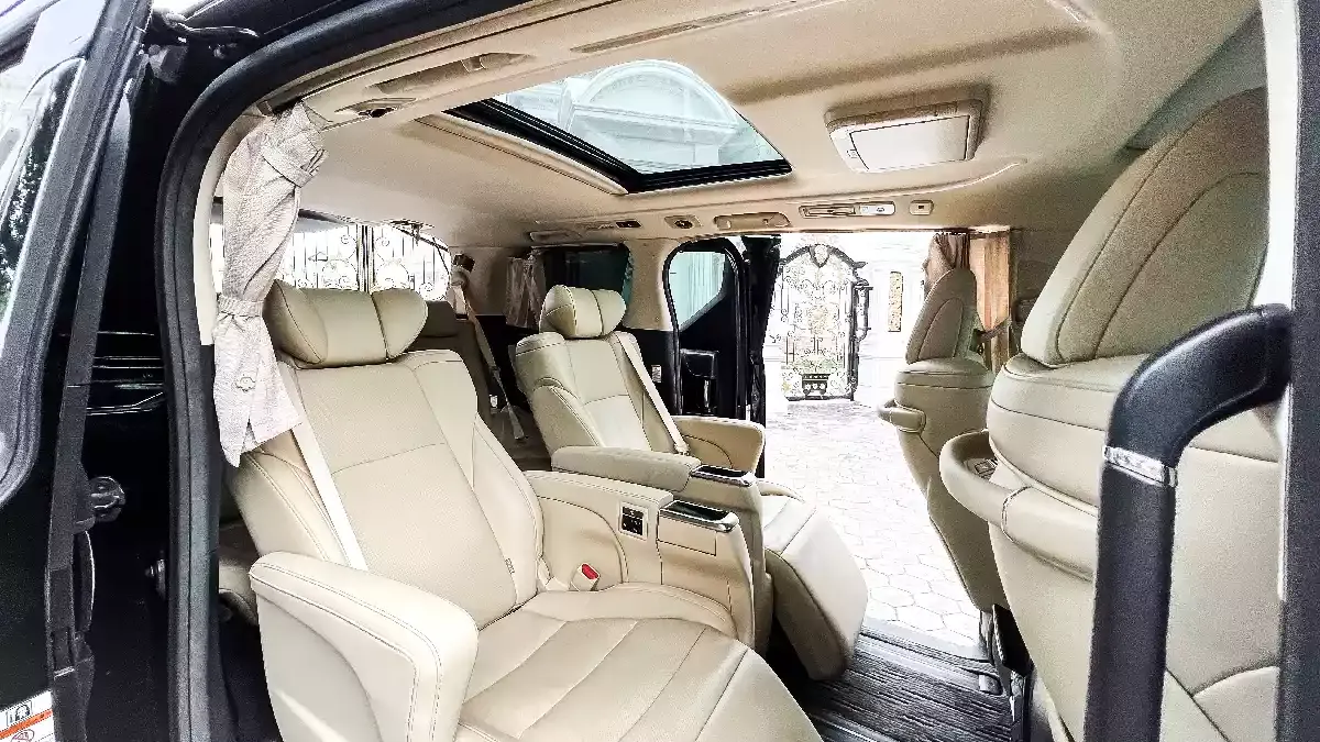 Alphard captain seats seen through the open sliding door